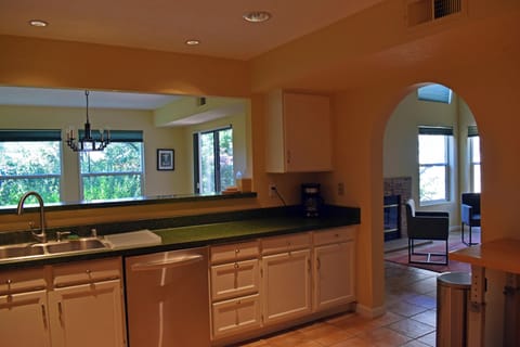Kitchen overlooks dining room