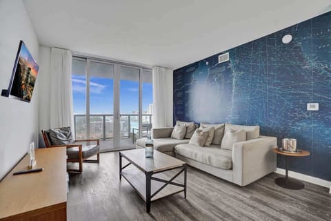Cozy open space living room with city and Canal view