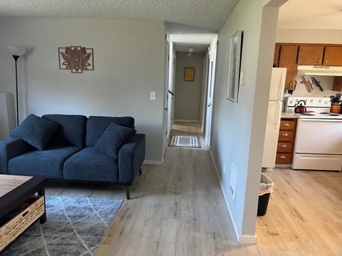 Main area to bath/laundry, closets (coat, linen & storage), entry & bedrooms.