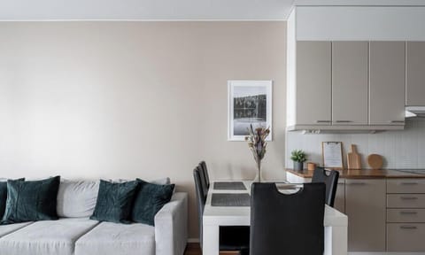 The apartment is equipped with all the modern amenities you need, including a fully stocked kitchen with a dishwasher and coffee maker