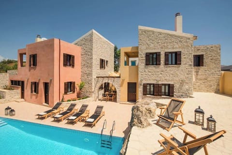 Facade of the Property – Traditional stone architecture blending seamlessly with the natural landscape.