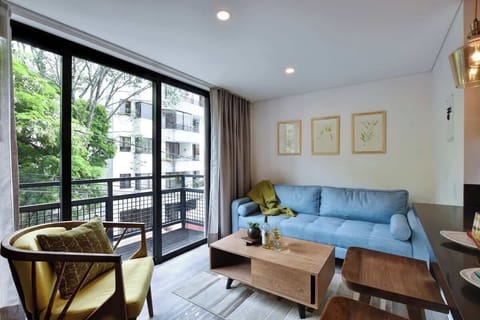 Living room with direct access to balcony.