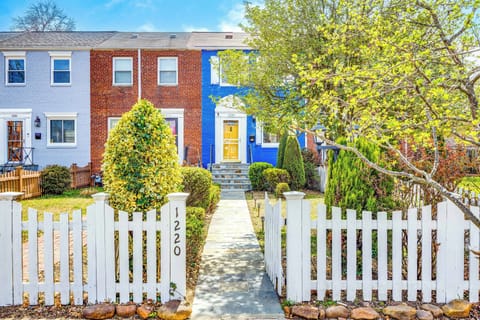 Entrance | Classic Blue brick meets a striking yellow door. 
