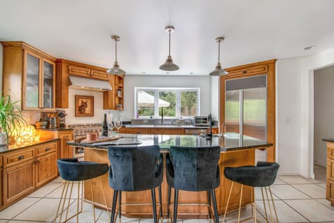 Kitchen | 3-Story Cabin | In-Unit Laundry | Central Heating & A/C