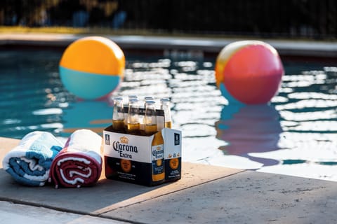 Relax by the pool with drink in hand!