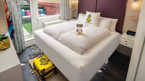 Unwind in crisp linens after a vibrant city day.