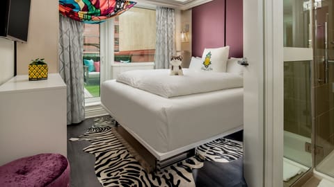 Wake up refreshed with daylight streaming beside the bed.