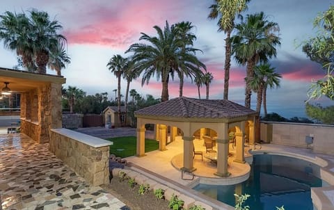 Beautiful luxury estate with covered patio, pool, spa, game room, and courtyards