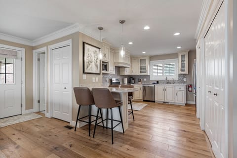 4 Barstools and 3 additional seats in the Great room for dining.