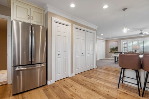 The Cottage kitchen has beautiful custom cabinetry, comes fully stocked with all major conveniences