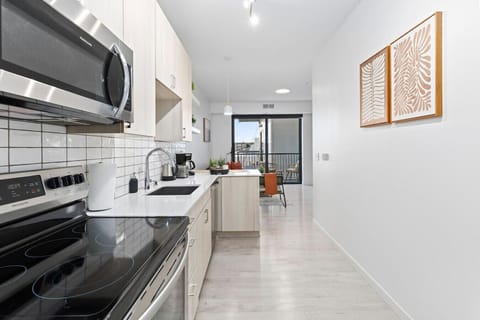 As you step into the kitchen, the clean lines and functional design make you eager to start cooking your favorite dishes.