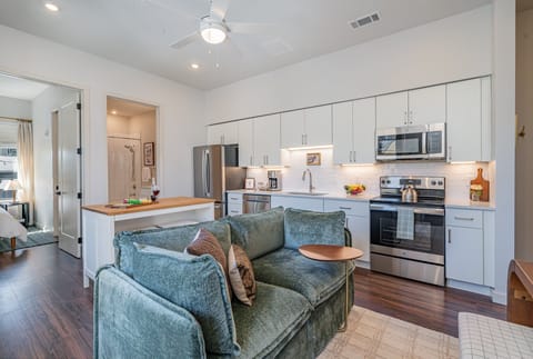Living Room with a cozy, stylish sofa and music-inspired decor, creating the perfect spot to relax and unwind after a day in Nashville.