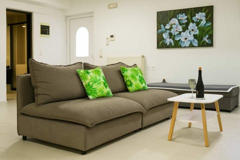 Living Room – Comfortable Seating with Natural Light
Relax in a cozy setting featuring a soft sofa, stylish decor, and plenty of natural light for a welcoming atmosphere.


