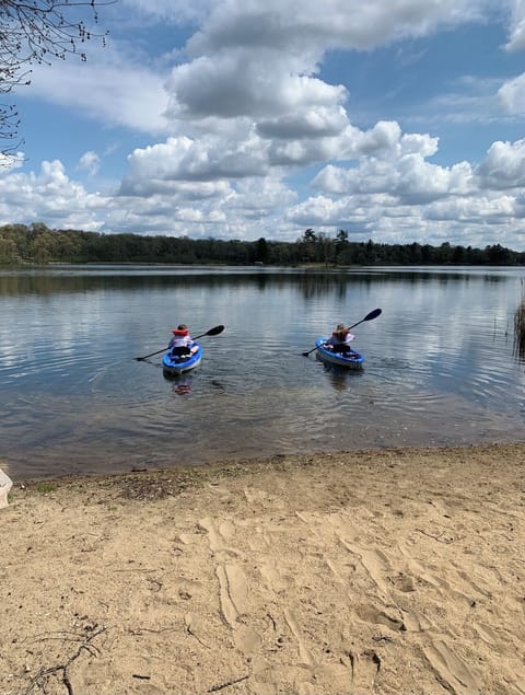 Paddle out, hop the pontoon, or just float — Fawn Lake mornings start right from your private beach. This is the lake-day energy every summer stay is built around.