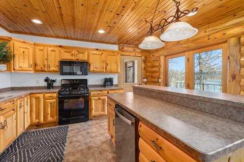 Cooking with a view never looked this good! This kitchen is fully loaded and ready for your next feast.