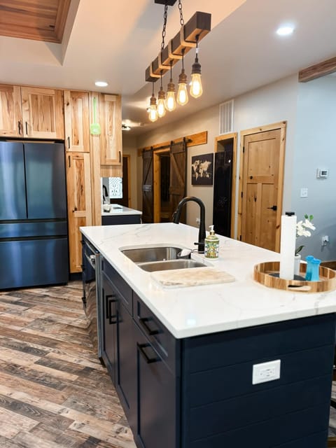 USB/C wall plug on both ends of the kitchen island.