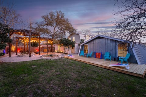 Spacious deck with seating and outdoor games.