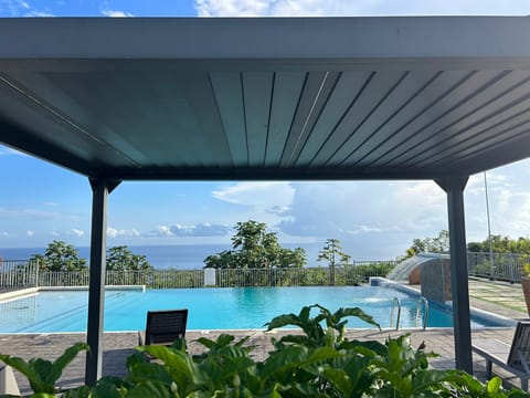 Community Infinity pool with Ocean and City View