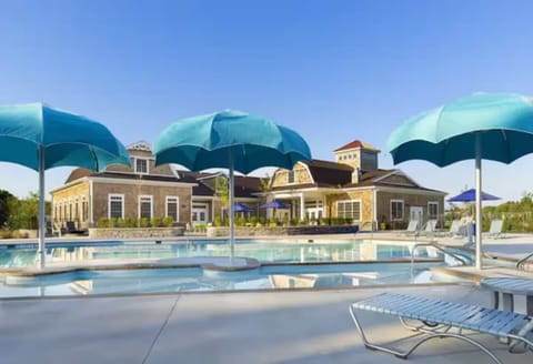 Outdoor pool at Ocean View Beach Club among other indoor amenities: billards