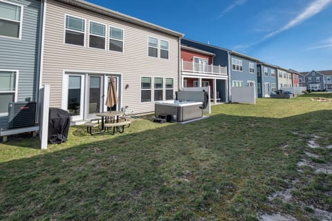 Grill, private hot tub and outdoor dining.