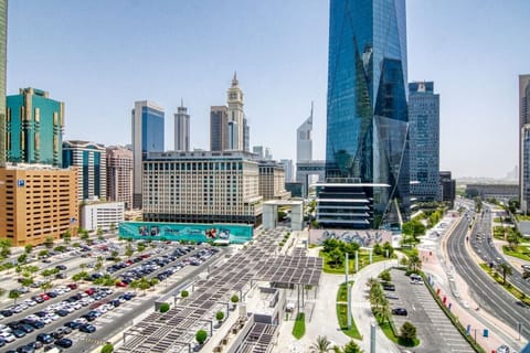 Panoramic City View: Experience Dubai`s skyline from your window, vibrant and bustling below!