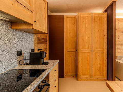 Wood, Cabinetry, Flooring, Interior Design, Countertop, Kitchen, Ceiling, Floor, Wood Stain, Cupboard