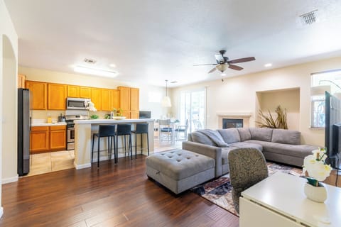 Kitchen with high counter and chairs