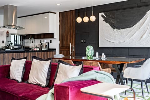 Mid-century modern design with rich textures and bold accent seating