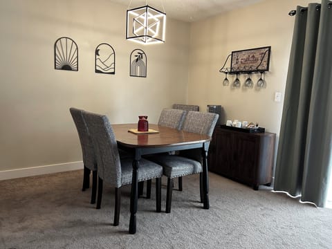 Dining can seat 6.  Huge Sliding Door lets in lots of natural light.