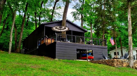 View of back deck and outdoor fire pit