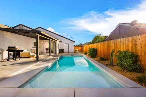Sparkling pool with serene desert views and relaxing ambiance