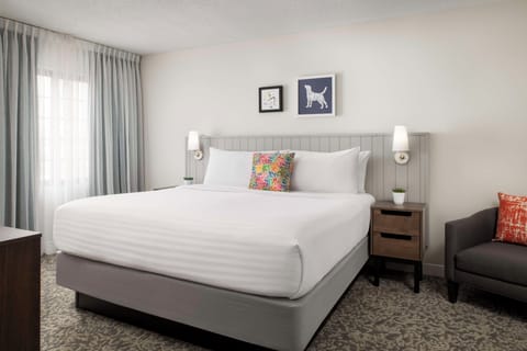 Unit with 1 King bed and 1 Queen bed. Exact unit will be assigned upon arrival. Views, colors, and decor may vary.