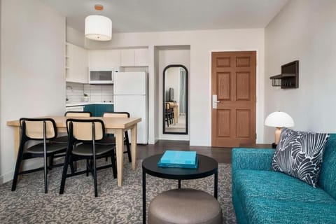 Living area. Exact unit will be assigned upon arrival. Views, colors, and decor may vary.