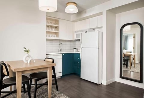 Cook easy meals in a bright kitchenette with dining nook.