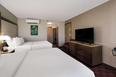 Stretch out after adventures with TV comfort and roomy layout.