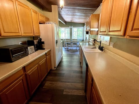 Upper Kitchen: dishwasher, fridge/freezer, stove, coffee maker, toaster, etc