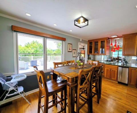 A table made for connection, surrounded by natural light and stunning scenery. The perfect place for family dinners, game nights, and laughter—with panoramic Smoky Mountain beauty just beyond the glass. Amazing long range views while dining.