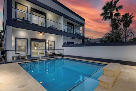 Refreshing private pool area with covered patio