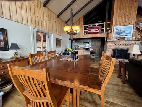Dining area with seating for 6, plus bar seating in kitchen.