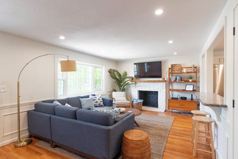 Living room with sectional and Smart TV for movie nights