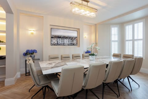 14 seating dinning table in dinning and living area
