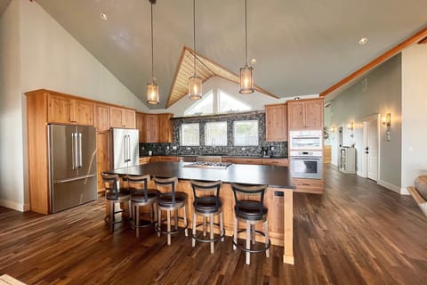 Large kitchen island with bar seating to keep the cook company!