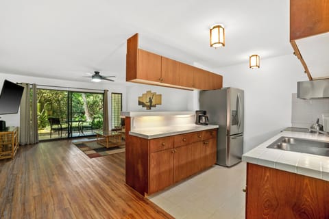 A kitchen that seamlessly flows into the living room, perfect for open and connected living.
