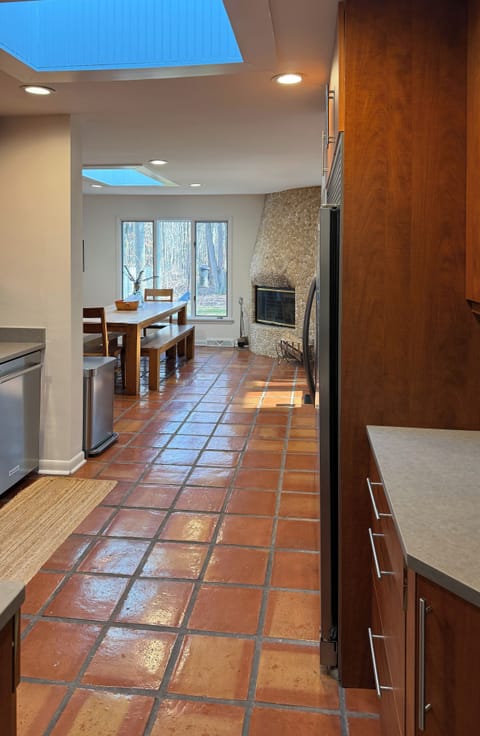 Large kitchen and dinning area with skylights for lots of natural lighting
