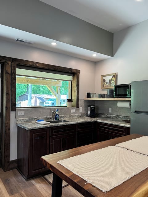 Keurig coffee station complete with coffee and all the fixings provided.