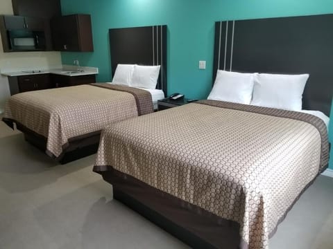 Recharge in a bright double-room designed for restful nights.