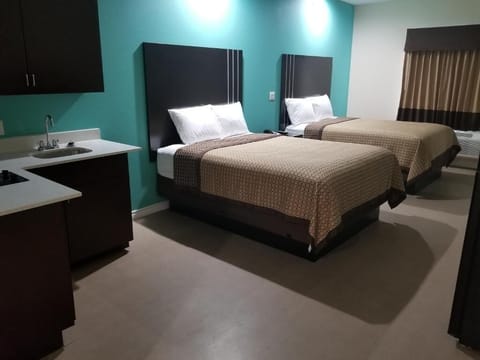 Unwind in a spacious double-room with handy kitchenette convenience.