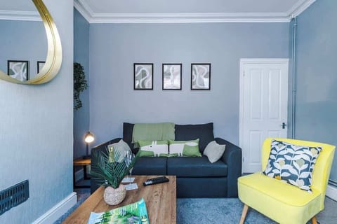 The spacious open-plan living space benefits from a double sofa bed, a 40-inch smart TV and plenty of space to sit down and relax.