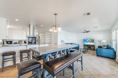 West building - The kitchen, dining, and living areas blend seamlessly for a bright and airy feel