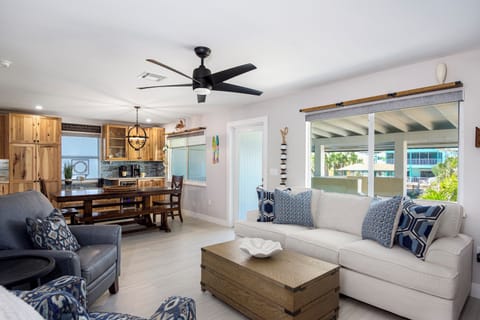 Open floor concept door leads to balcony.